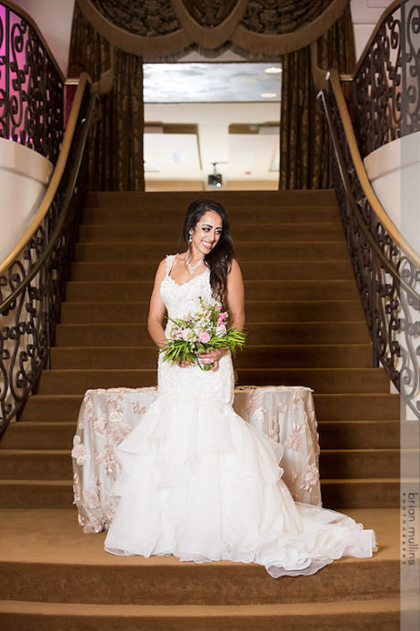 bride with bouquet in grand marquis ballroom