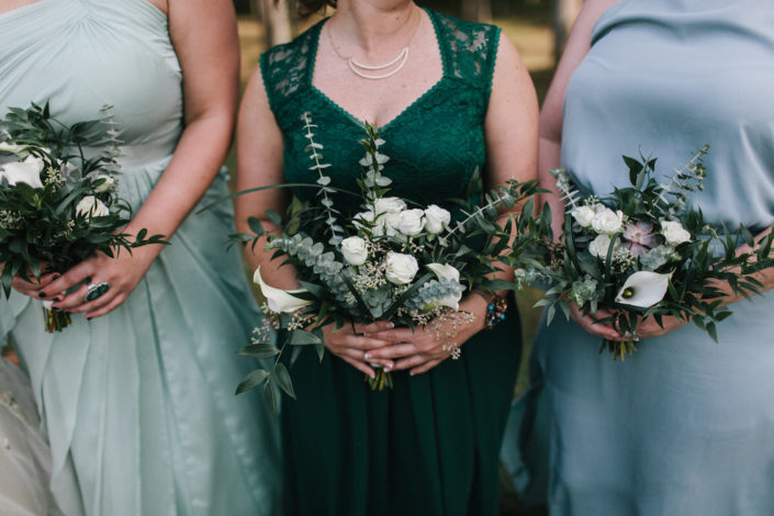 Bridesmaids with bouquets for green wedding in Chapel Hill