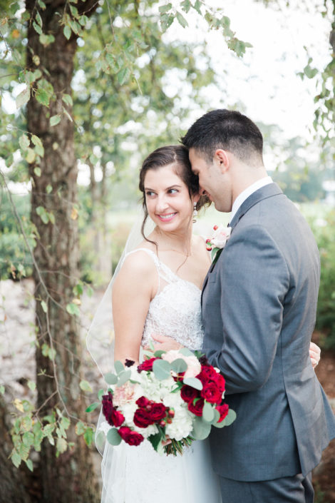 bride-groom-portrait-maroon-bouquet