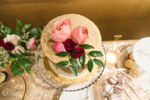 wedding-cutting-cake-flowers