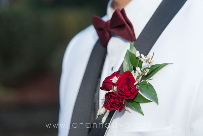 groom-boutonniere-marsala-maroon-spray-roses
